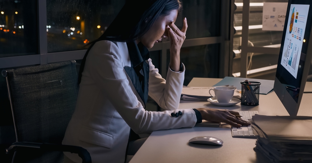 businesswoman working overtime at the office