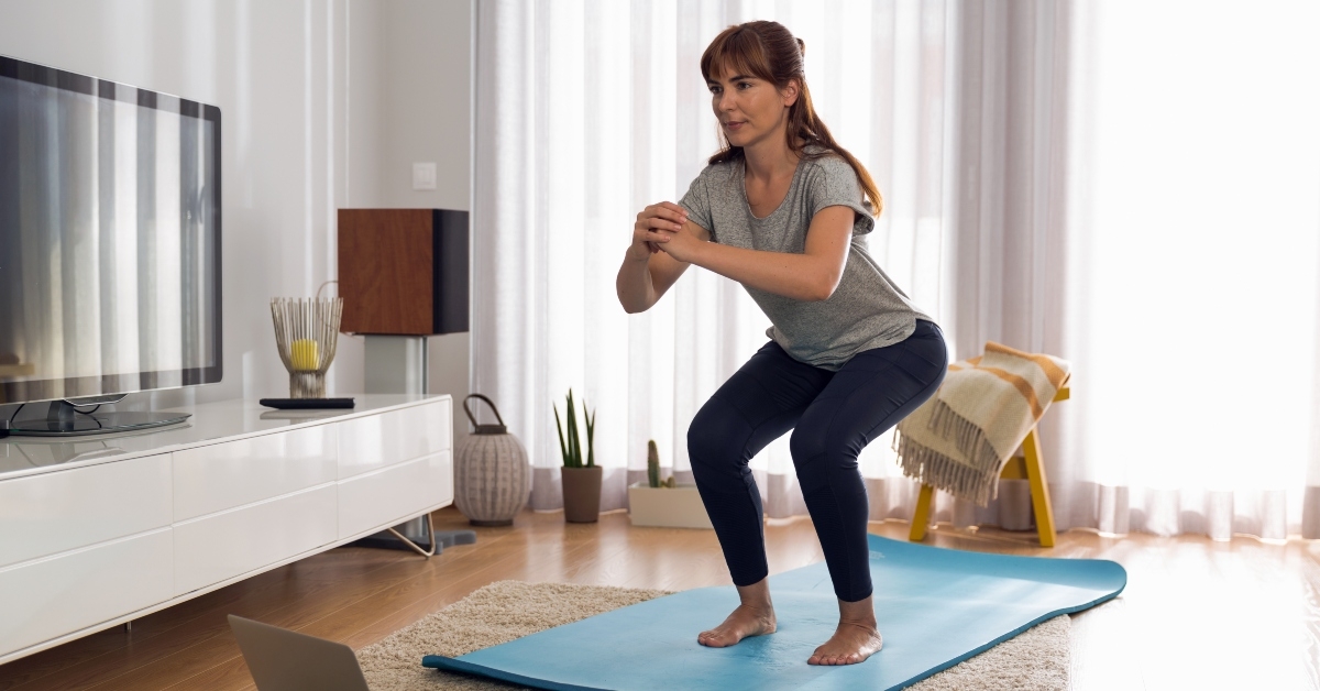 woman doing exercise at home
