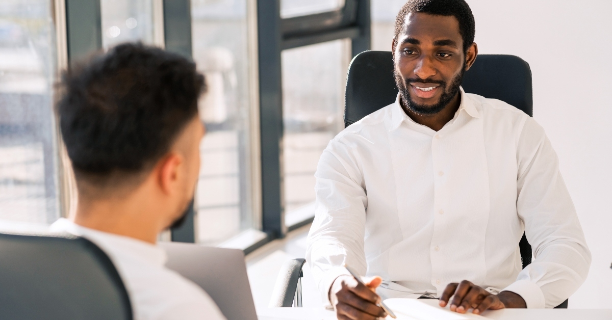 head of the company conducts job interview