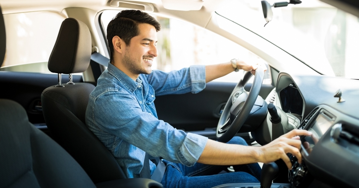 Young man driving a car