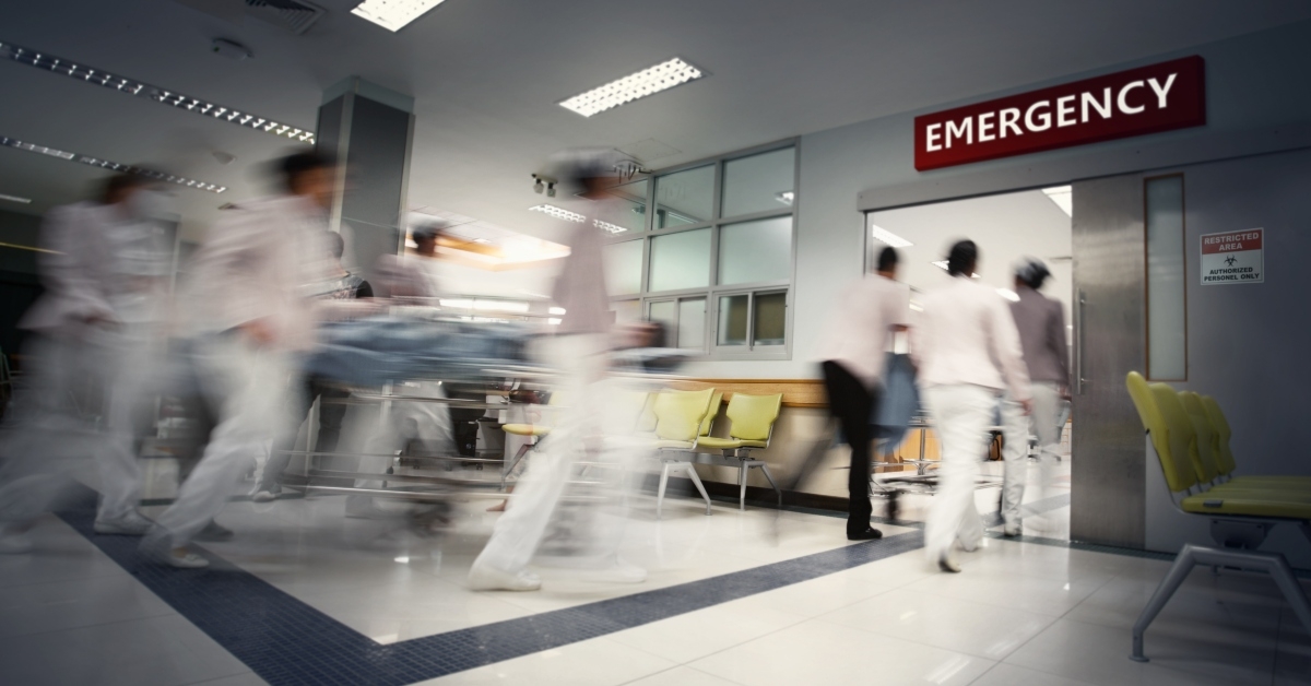 blurred photograph of a patient on stretcher