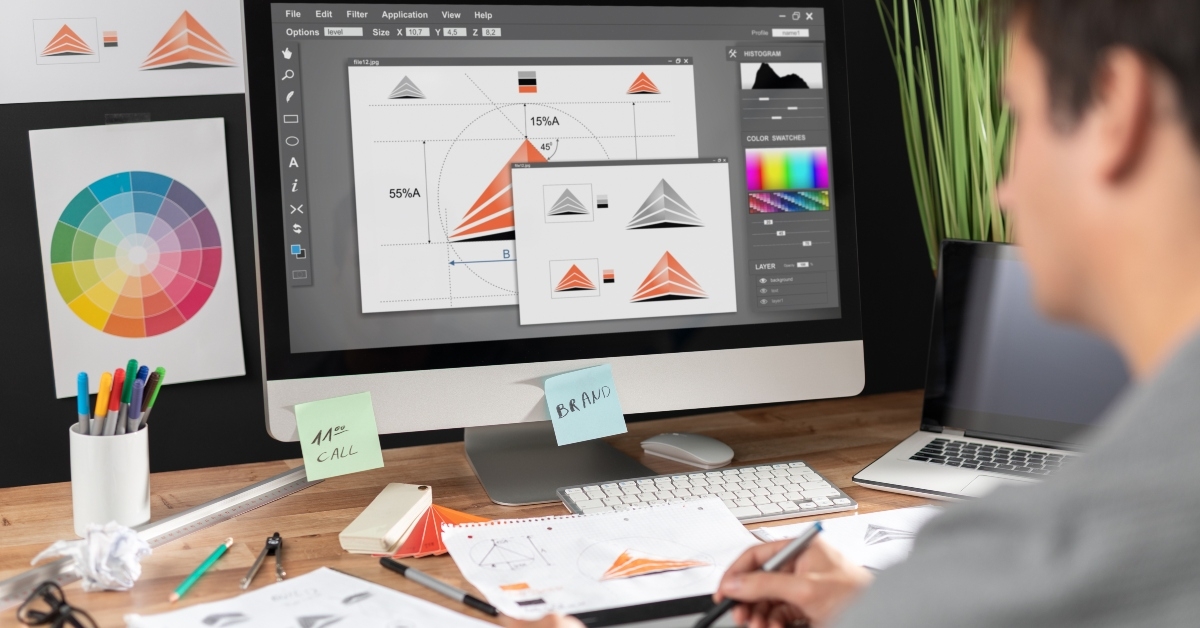 graphic designer drawing sketches logo design