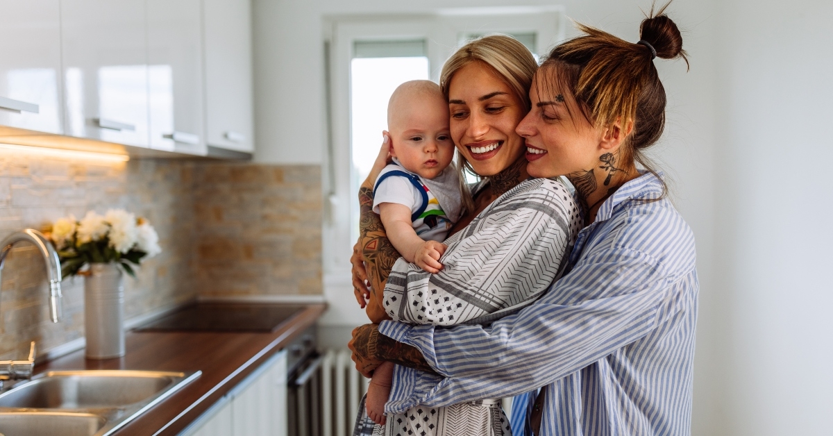 lesbian women with a baby boy at home