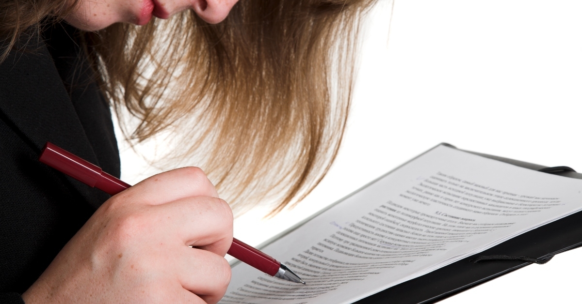 woman hand pen and document