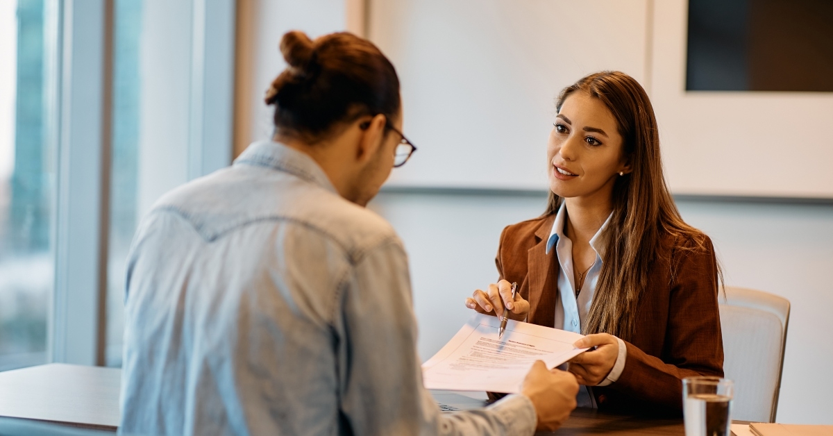 bank manager going through agreement with her client
