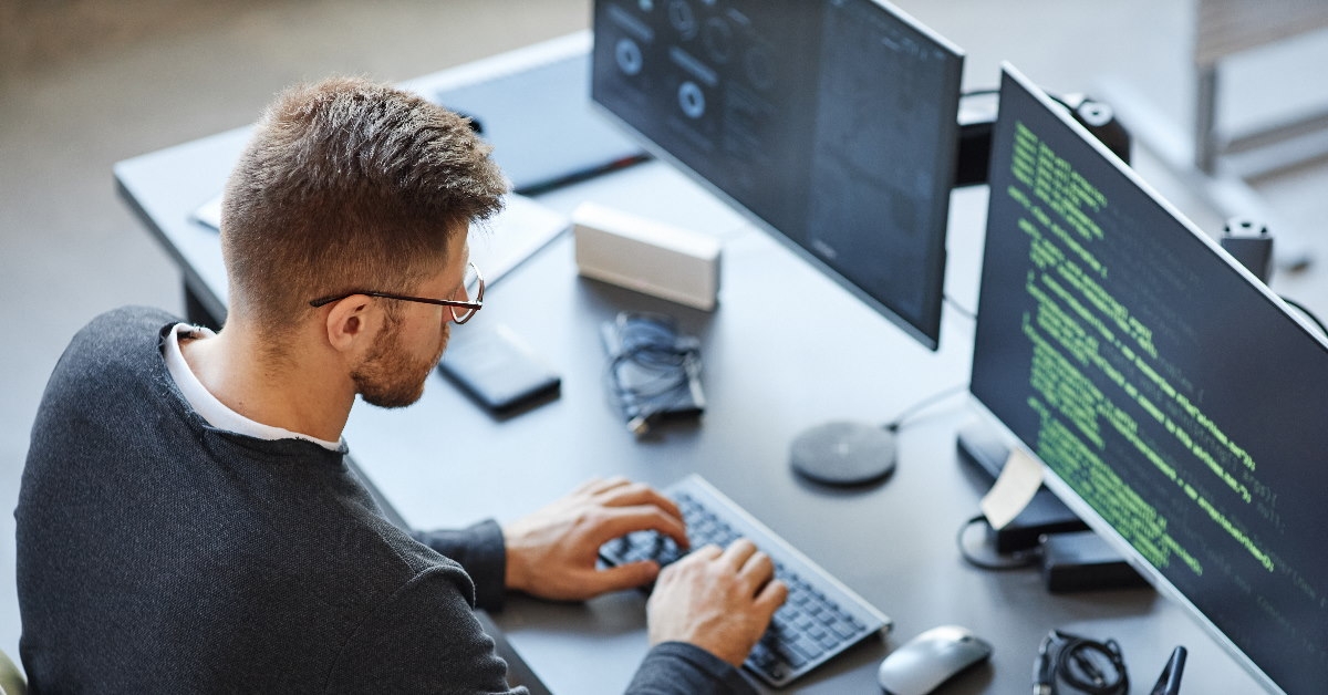 software developer coding in office 