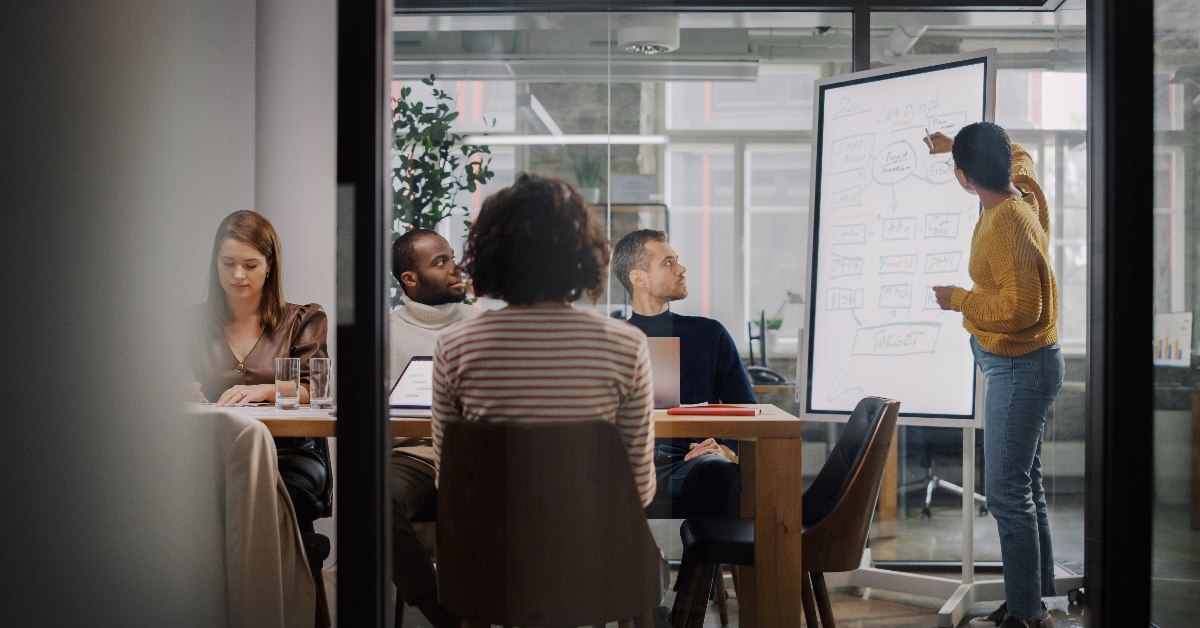  woman giving presentation at office