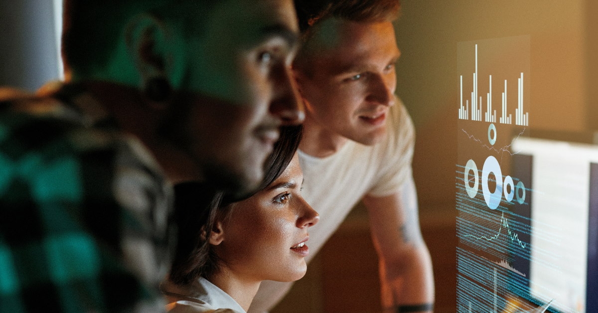 young programmers at office working on project together