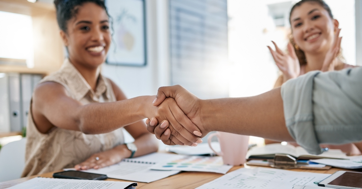 handshake with a businesswoman for a deal