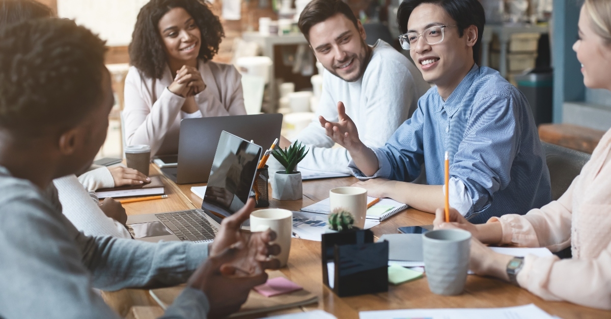 young people having business meeting in office