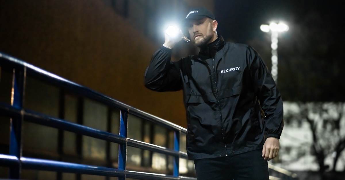 security guard walking building perimeter