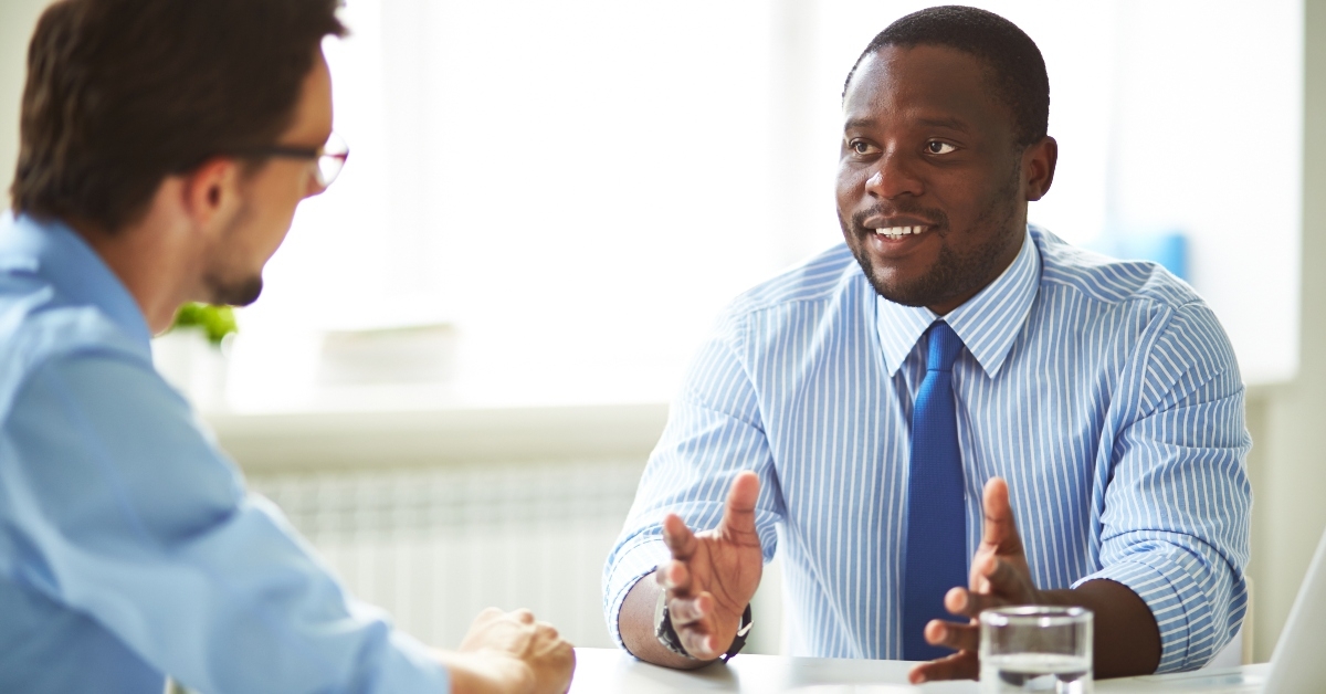 HR manager sitting at office desk while conducting interview