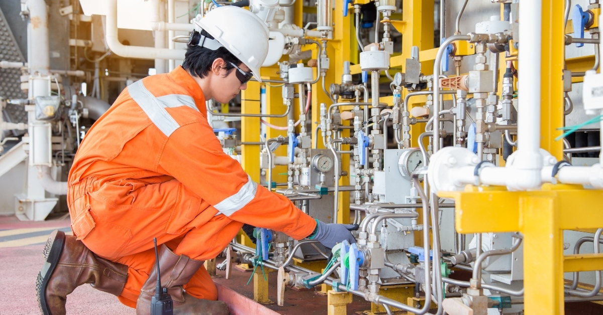 production operator adjusts flow rate of corrosion