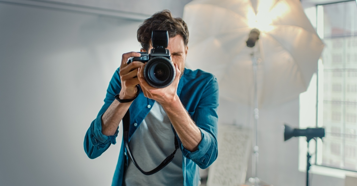 photographer holding the camera