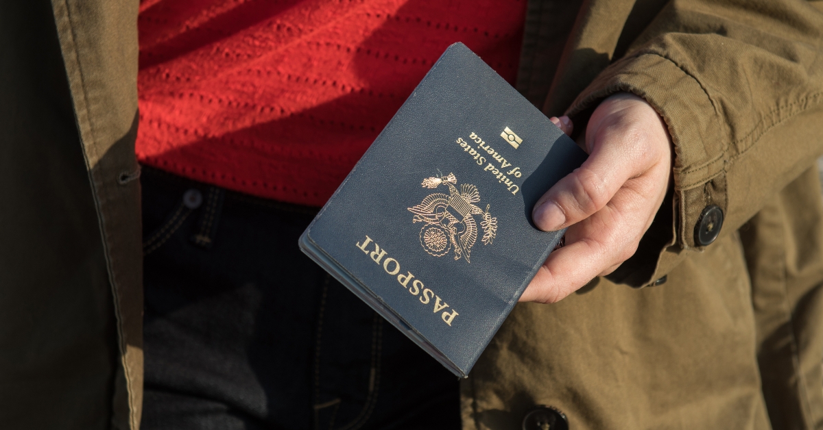 woman holding passport