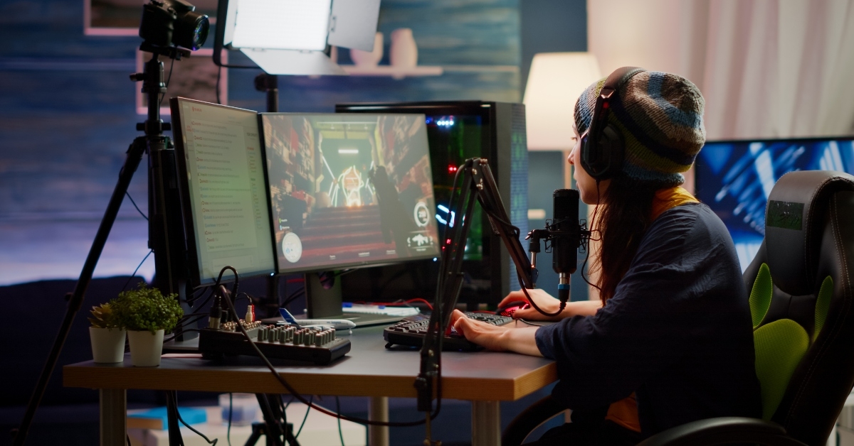 woman streamer checking sound using professional mixer