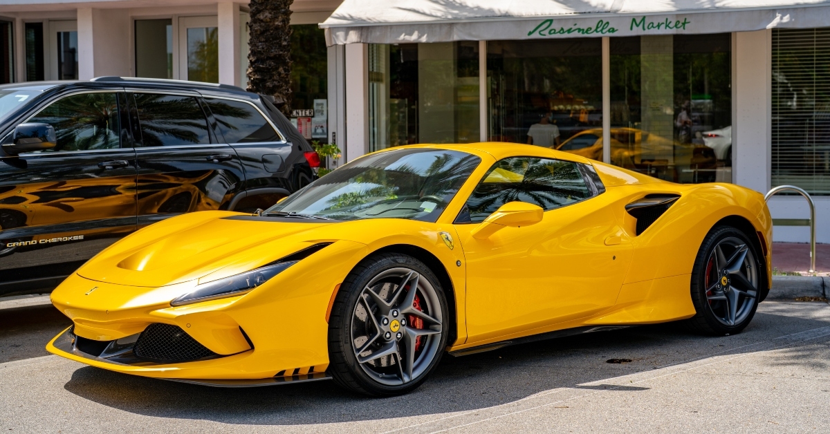 yellow Ferrari parked on the street