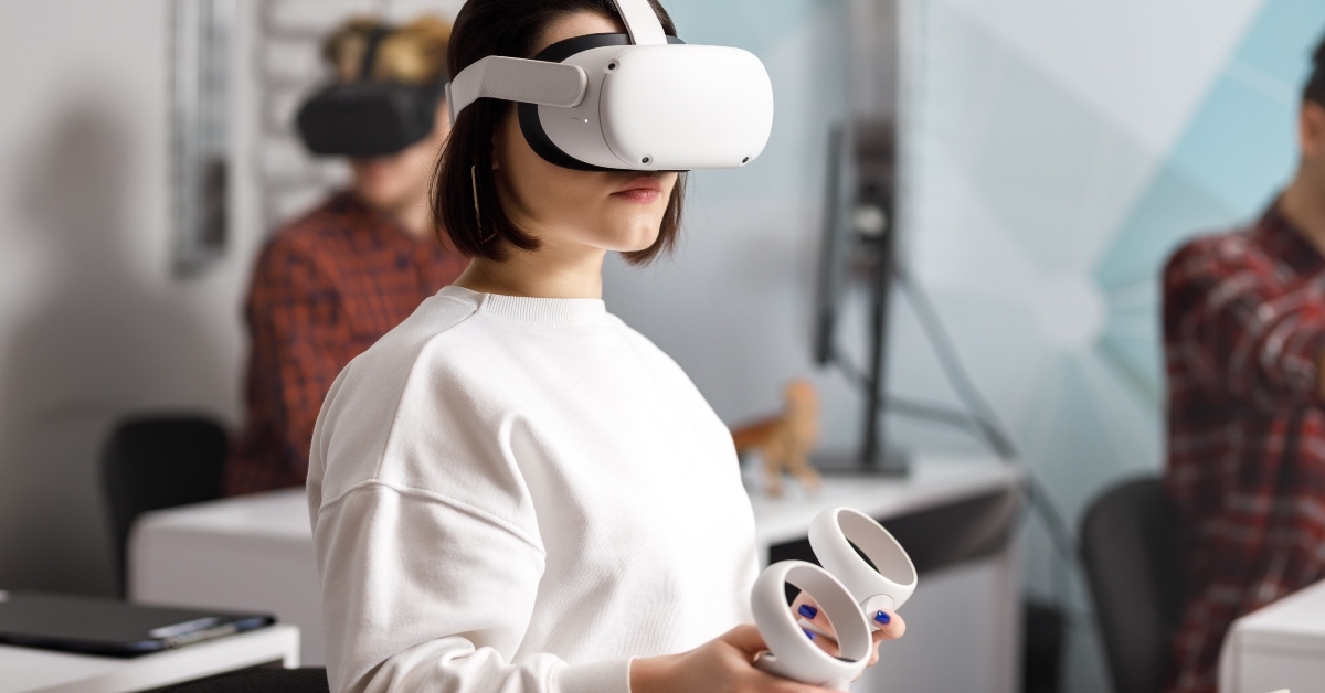 young woman testing VR glasses