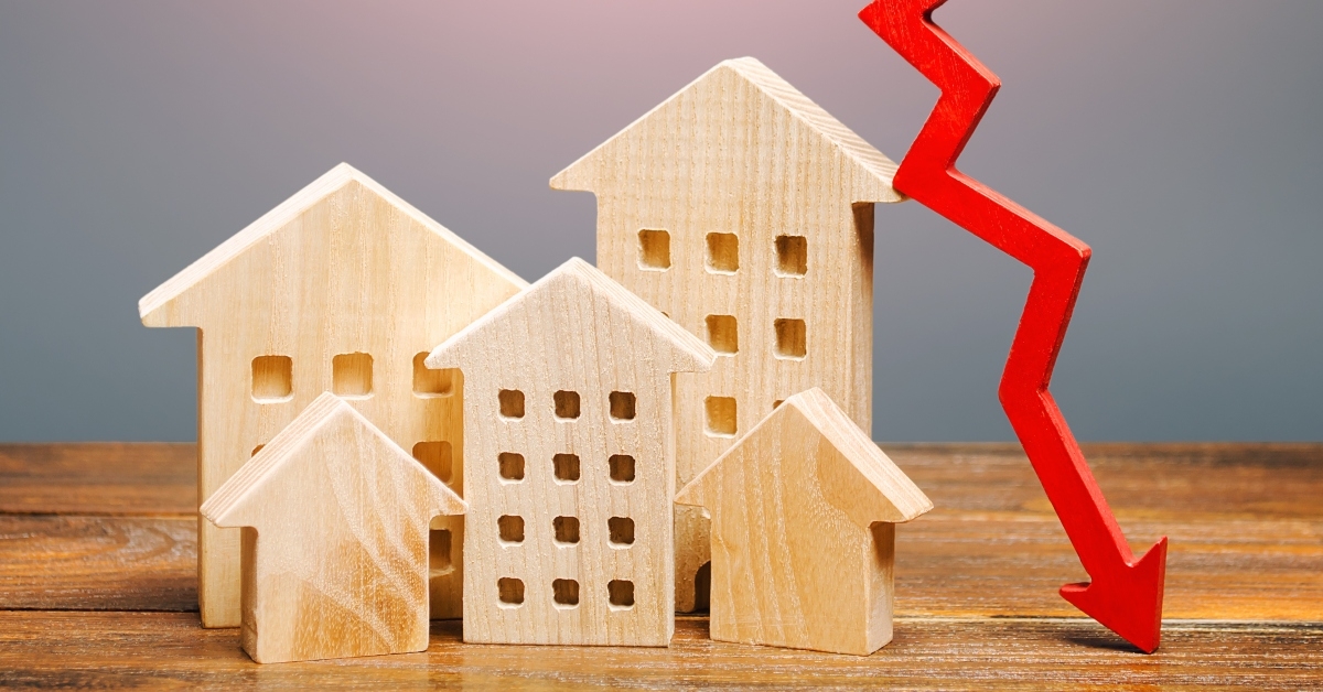 real estate houses and a red arrow down