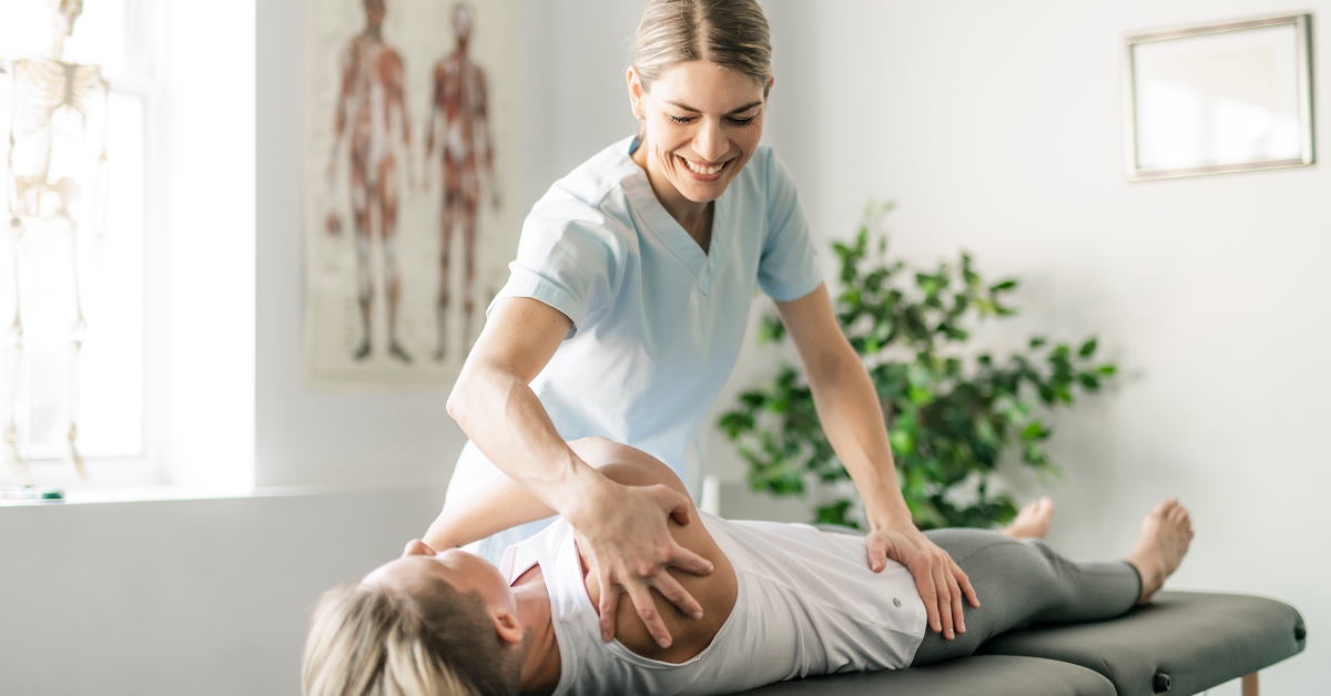 female physiotherapist at rehabilitation centers giving therapy to woman client