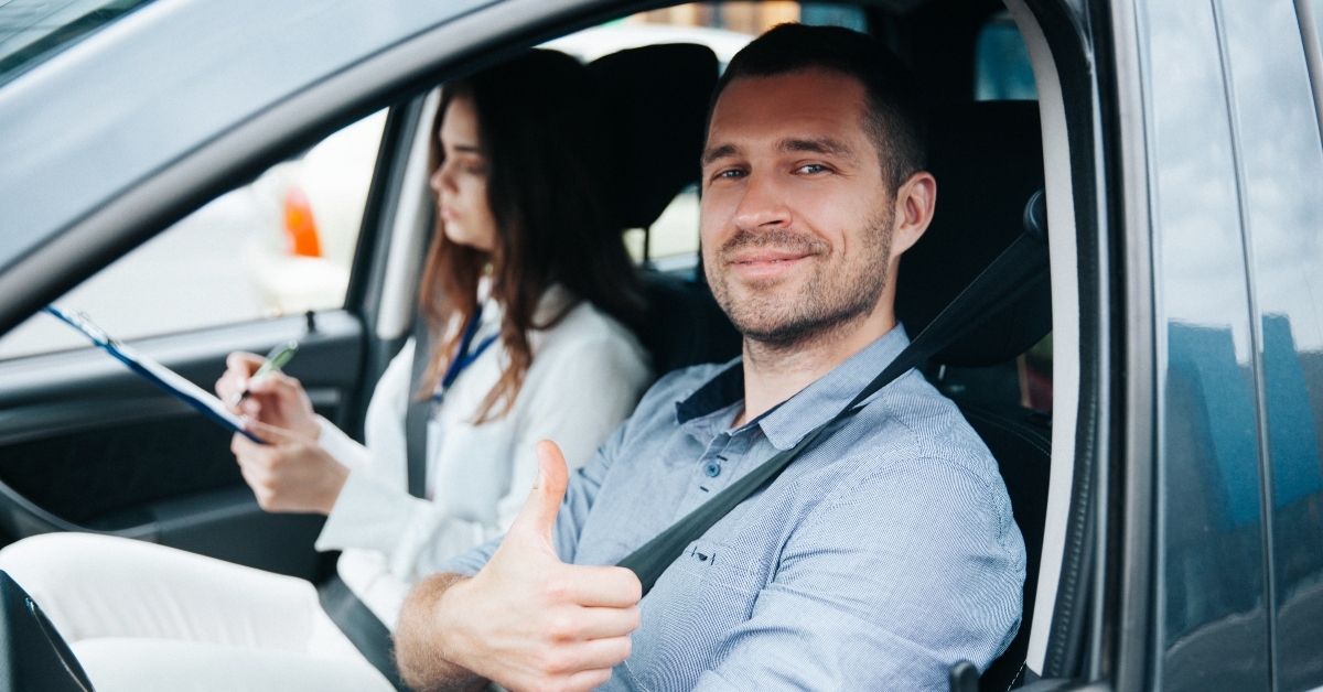 man excited about his successful driving license exam