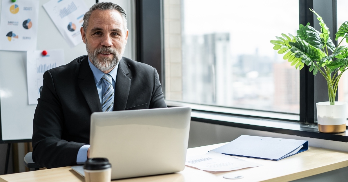 senior businessman working in office workplace