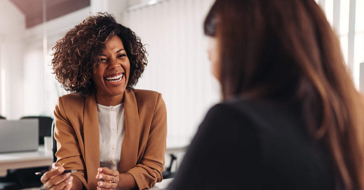 african american female advisor giving consultation to woman