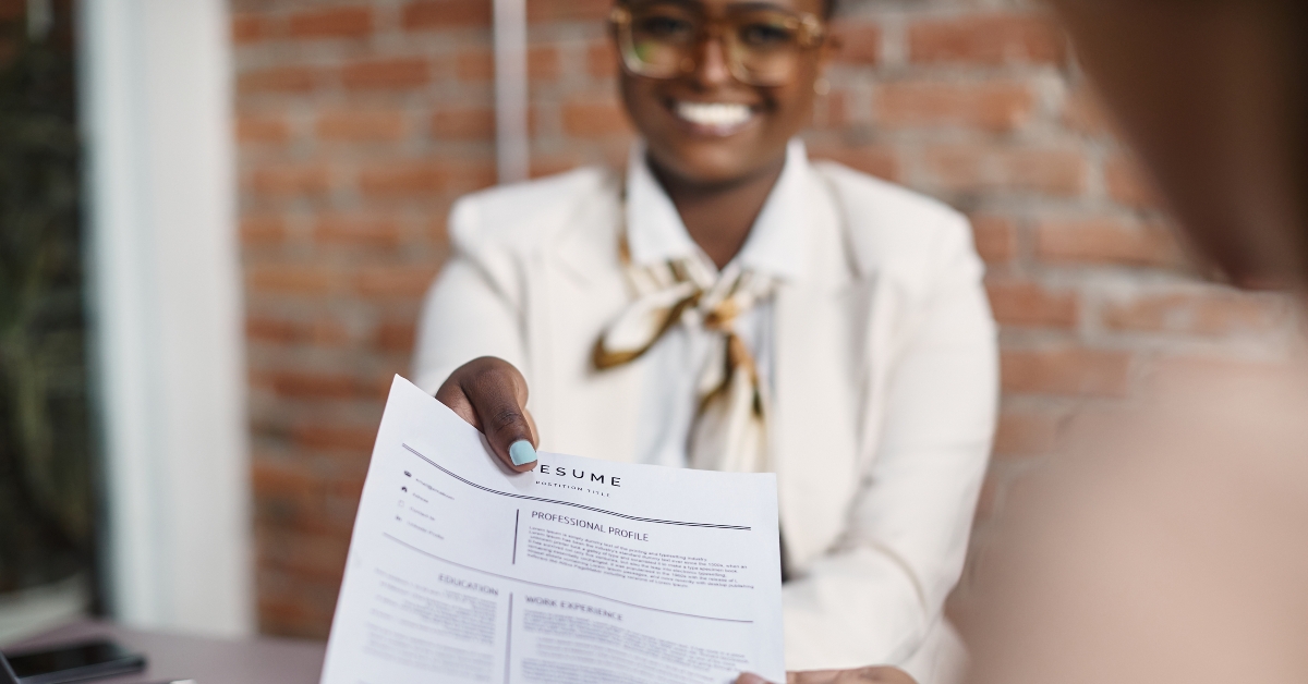 businesswoman gives her resume