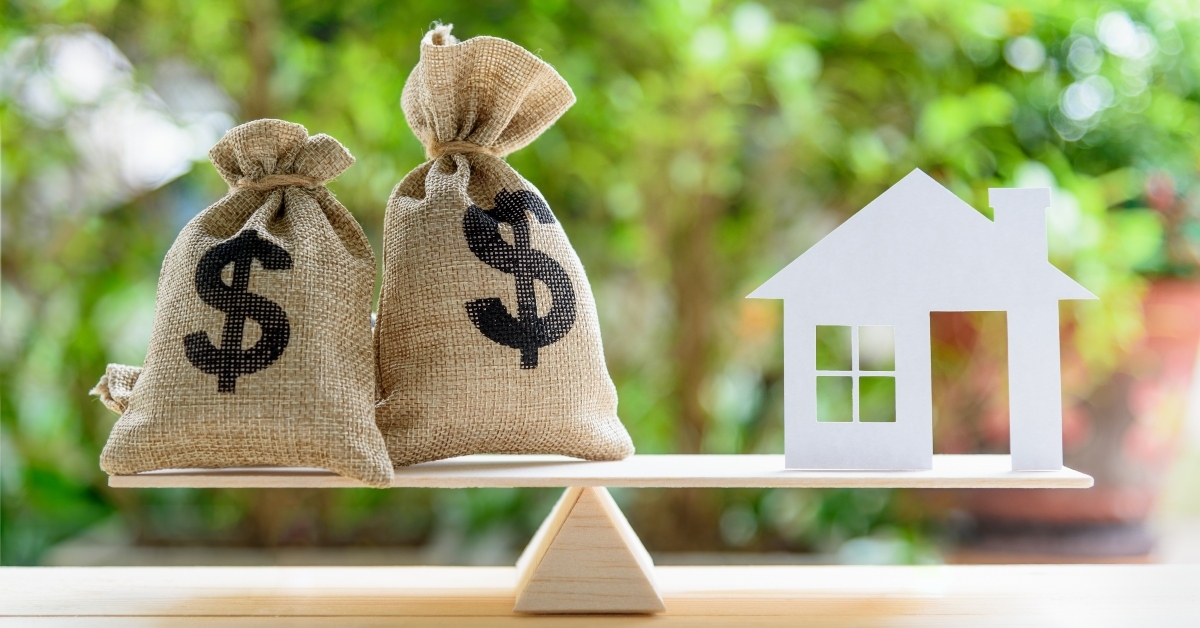 house paper model US dollar hessian bags on a wood balance scale