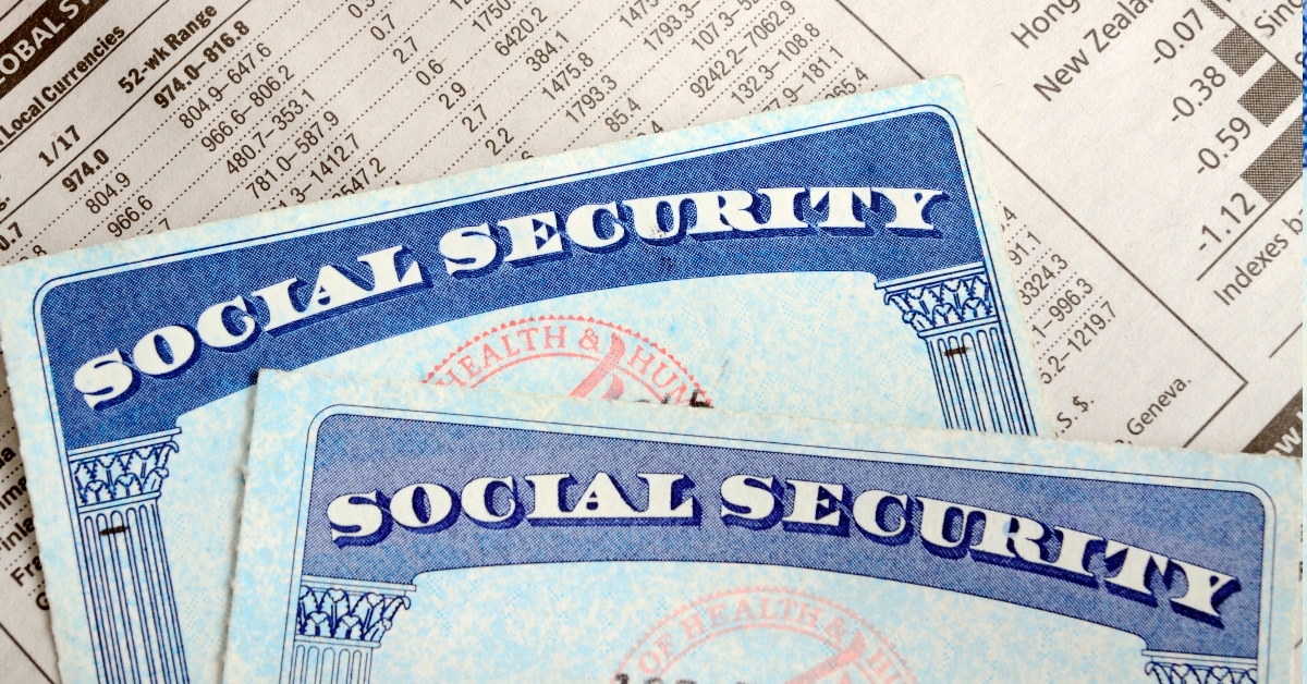social security and retirement income cards on top of papers