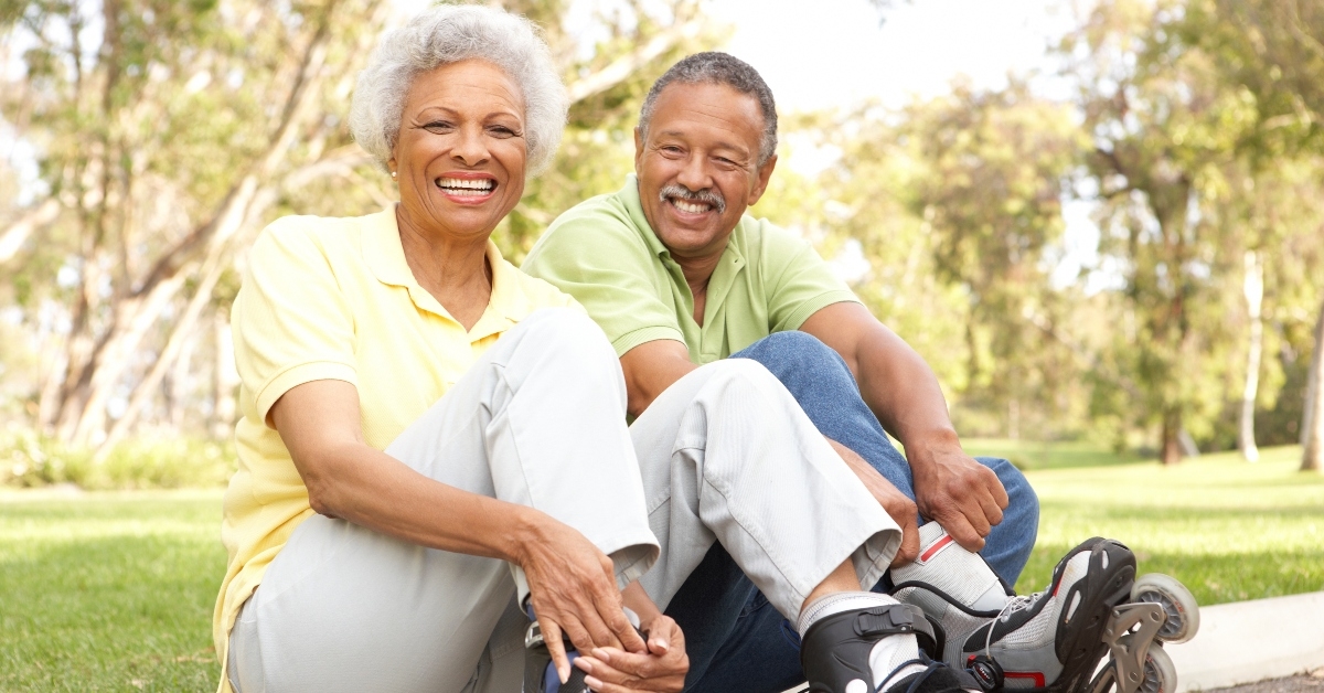 senior couple putting line skates