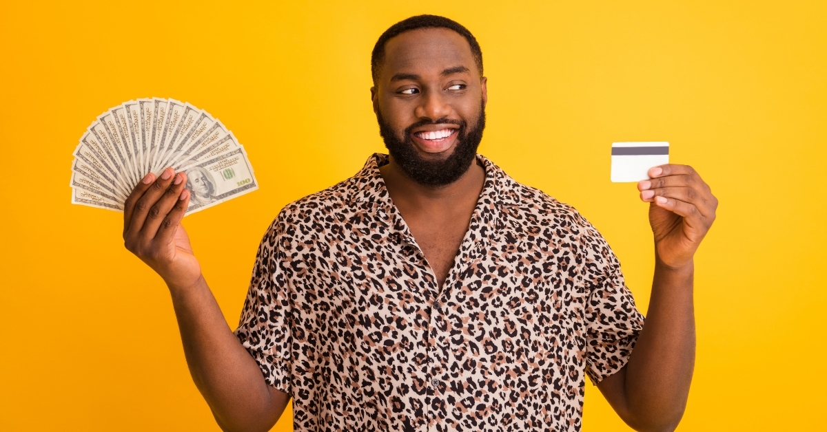 cheerful guy holding in hands