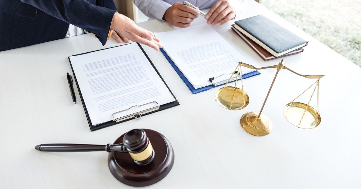 female lawyer  discussing negotiation legal case with client