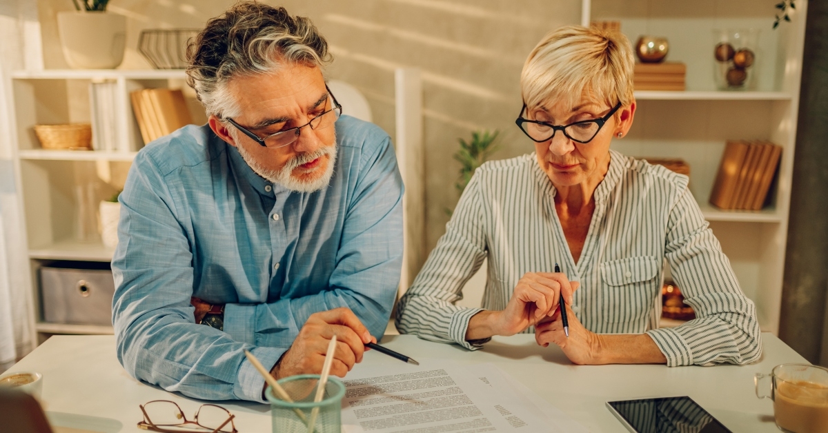 senior couple checking their finances