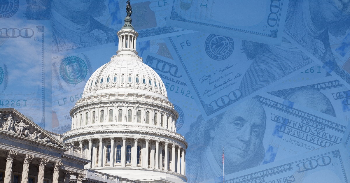 united states congress building with one hundred dollar bills in background during day time