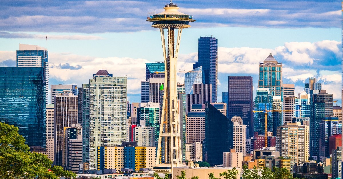 green trees in front of skyscrapers of seattle