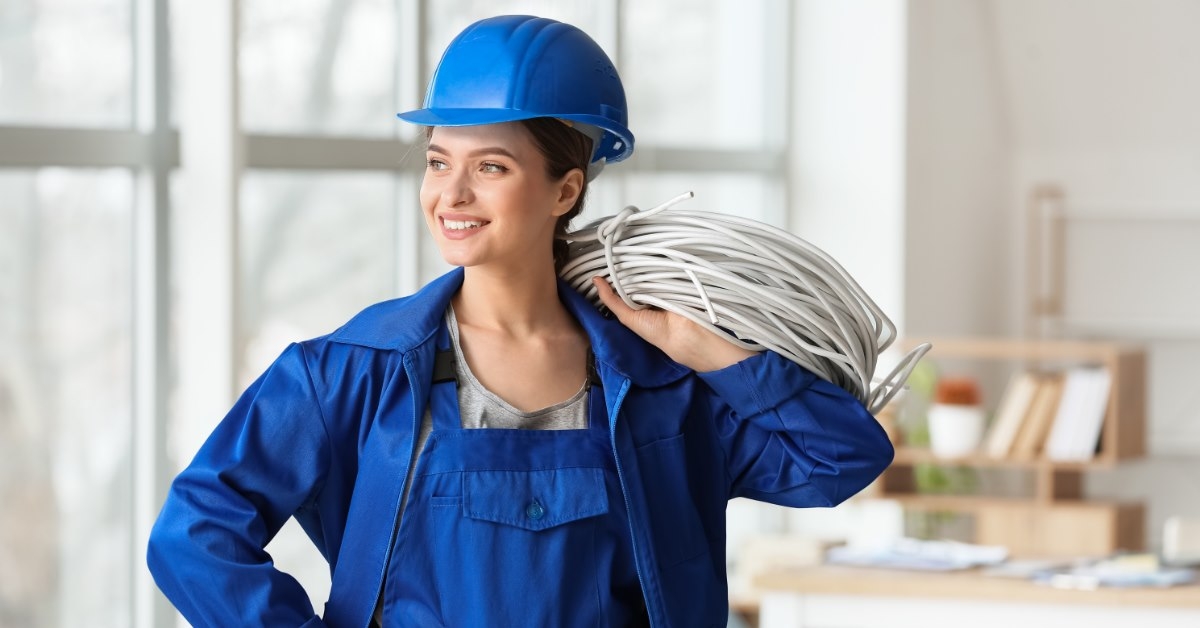 female electrician wearing working uniform