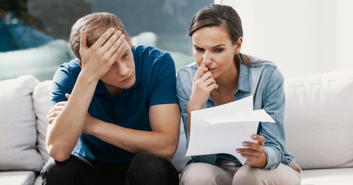 couple looking frustrated