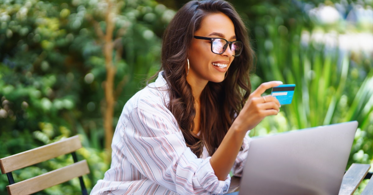 woman using card for online payment