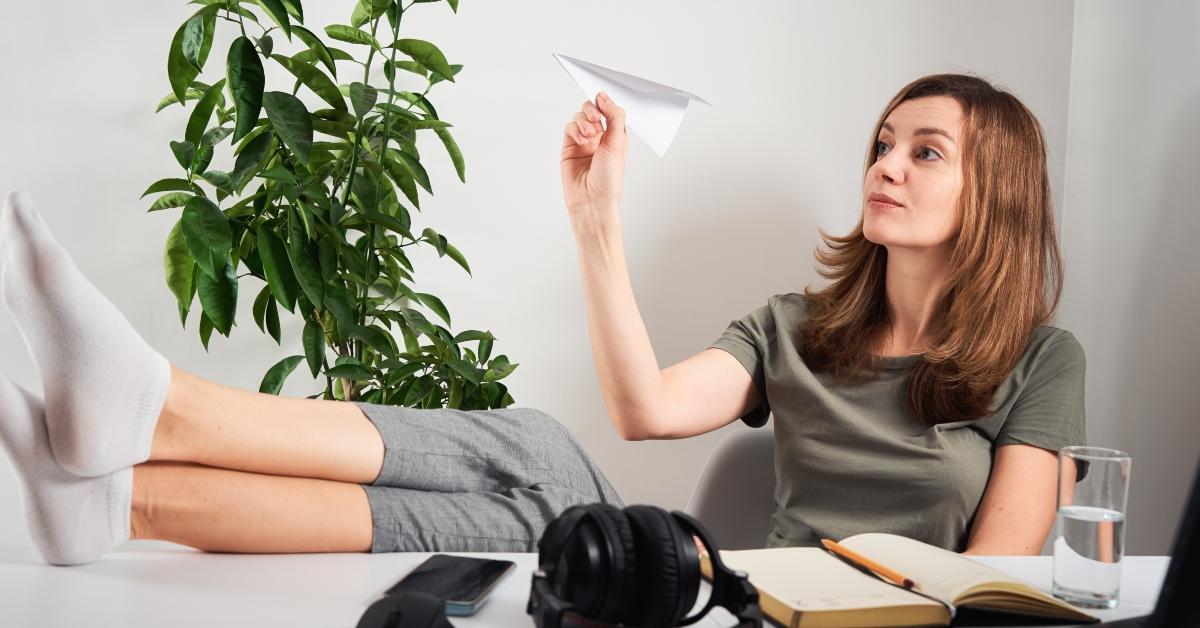 woman procrastinates at home workplace