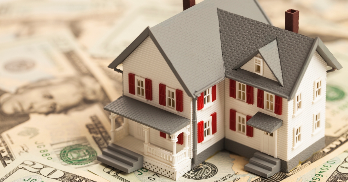 single family house on pile of money