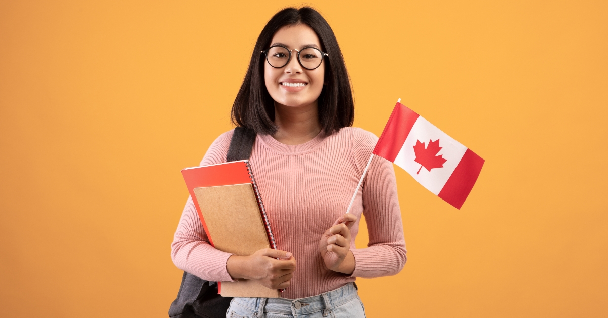 asian woman in glasses with notebooks
