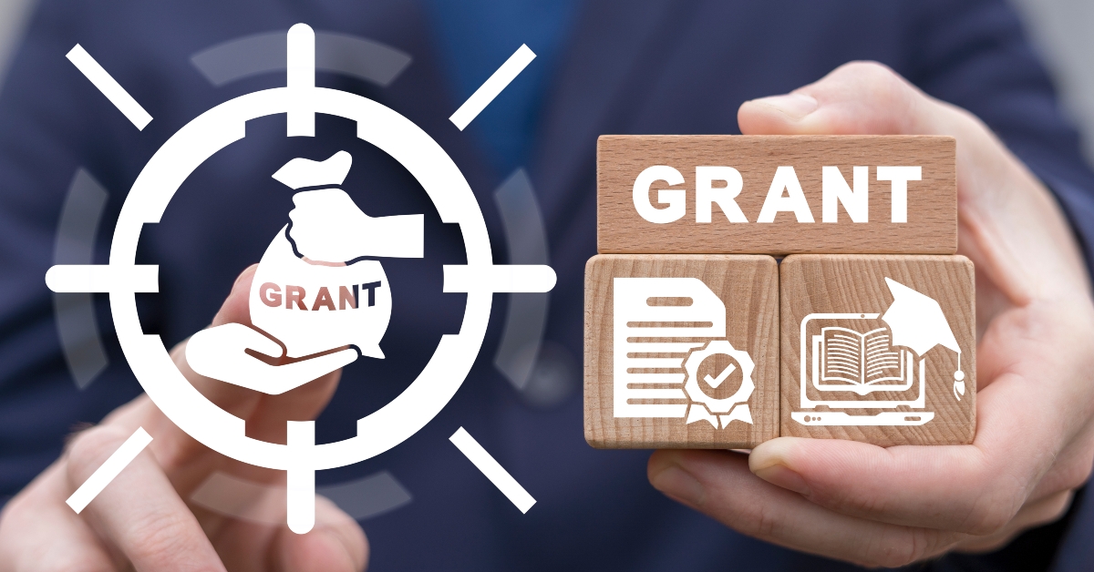 businessman using virtual touchscreen and holding wooden blocks