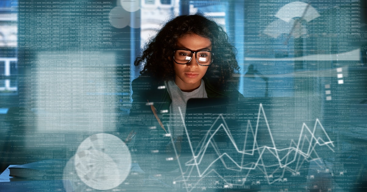 african american woman using computer at work to solve statistics problems