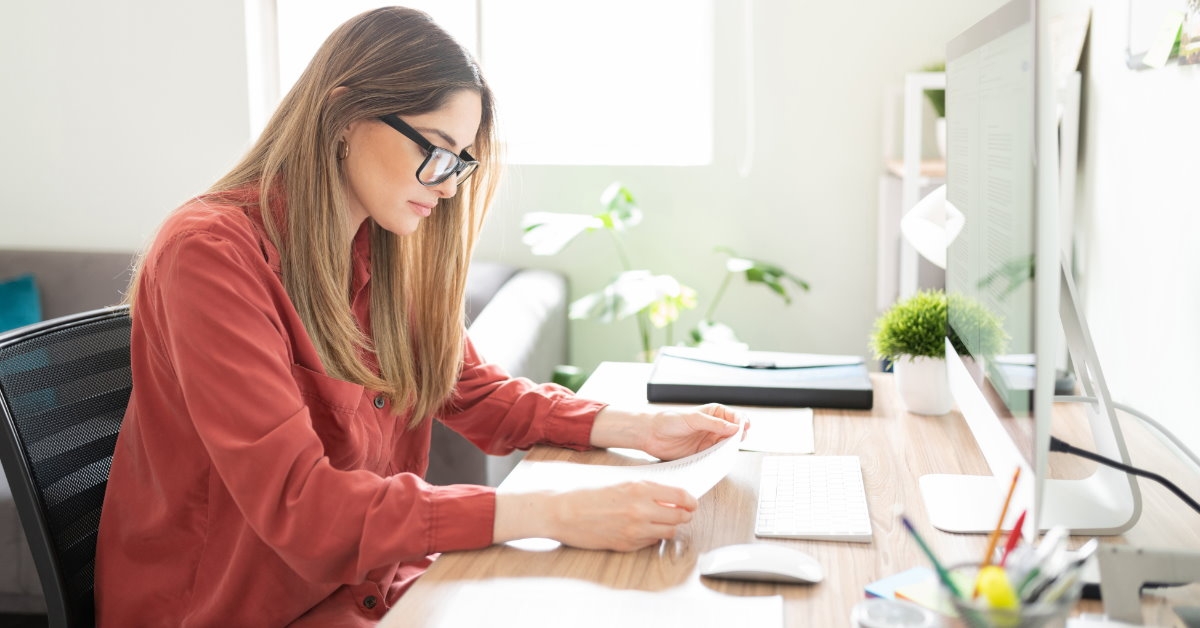 beautiful woman working on translating documents