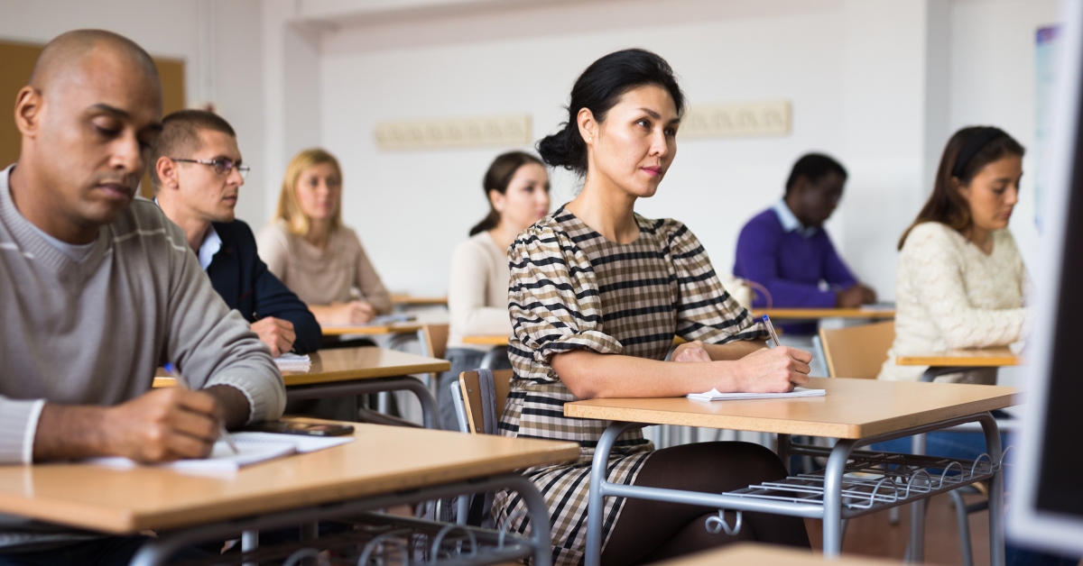 Japanese woman listening carefully during lecture