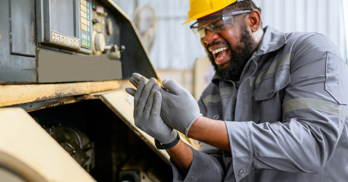 worker with accident at factory