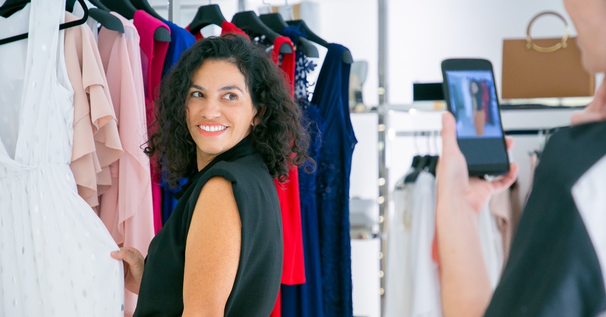 photographing friend in a clothing store