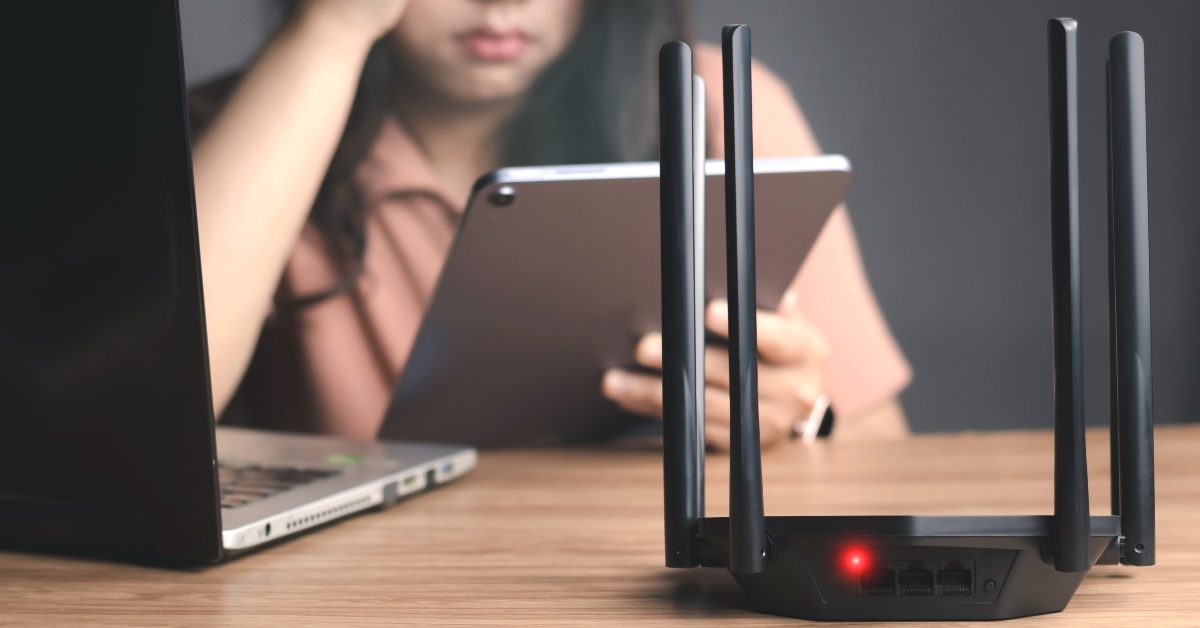 Wifi router and young woman