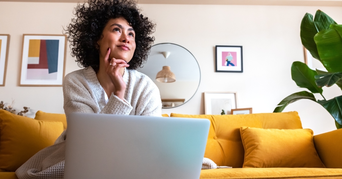 woman using laptop working at home
